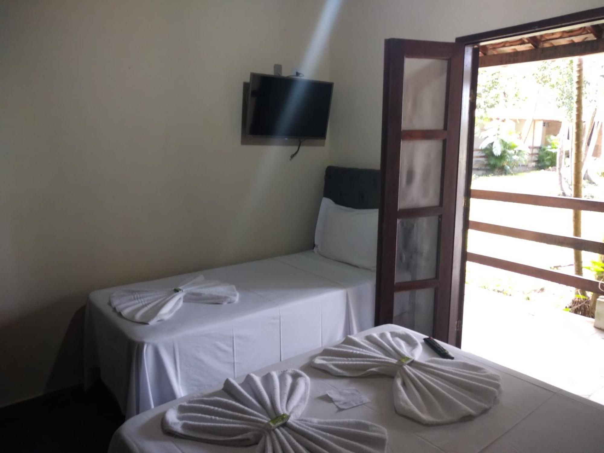 Hotel Praia Da Paixao Prado Bagian luar foto