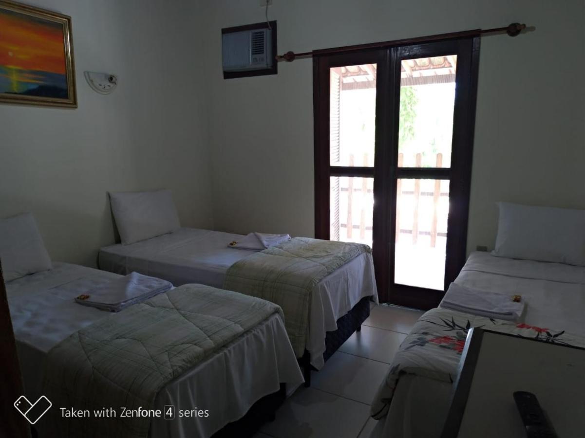 Hotel Praia Da Paixao Prado Bagian luar foto