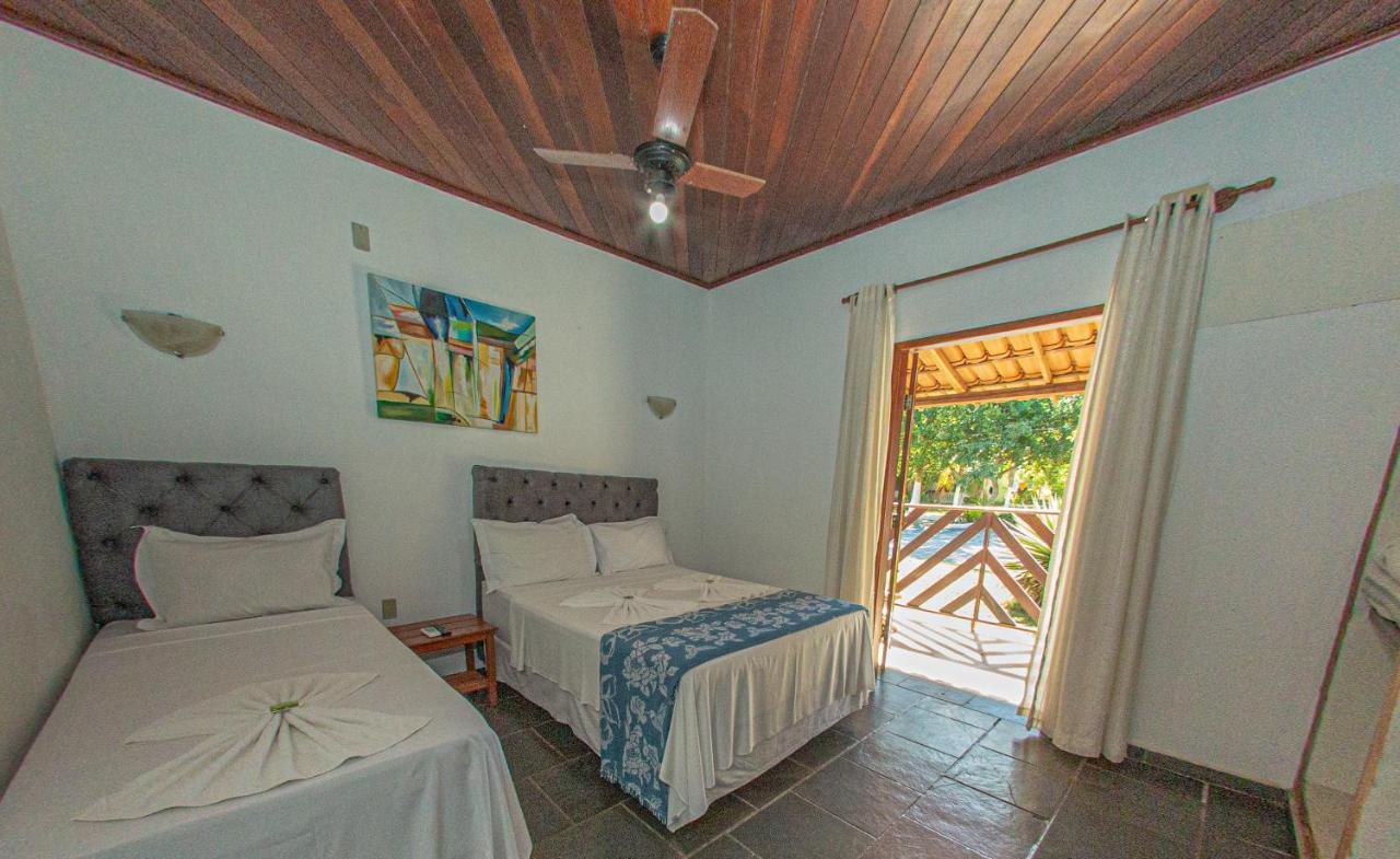 Hotel Praia Da Paixao Prado Bagian luar foto