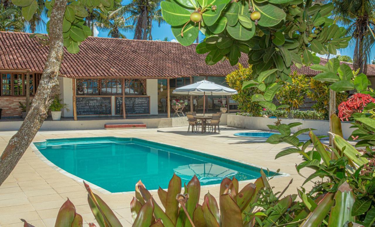 Hotel Praia Da Paixao Prado Bagian luar foto