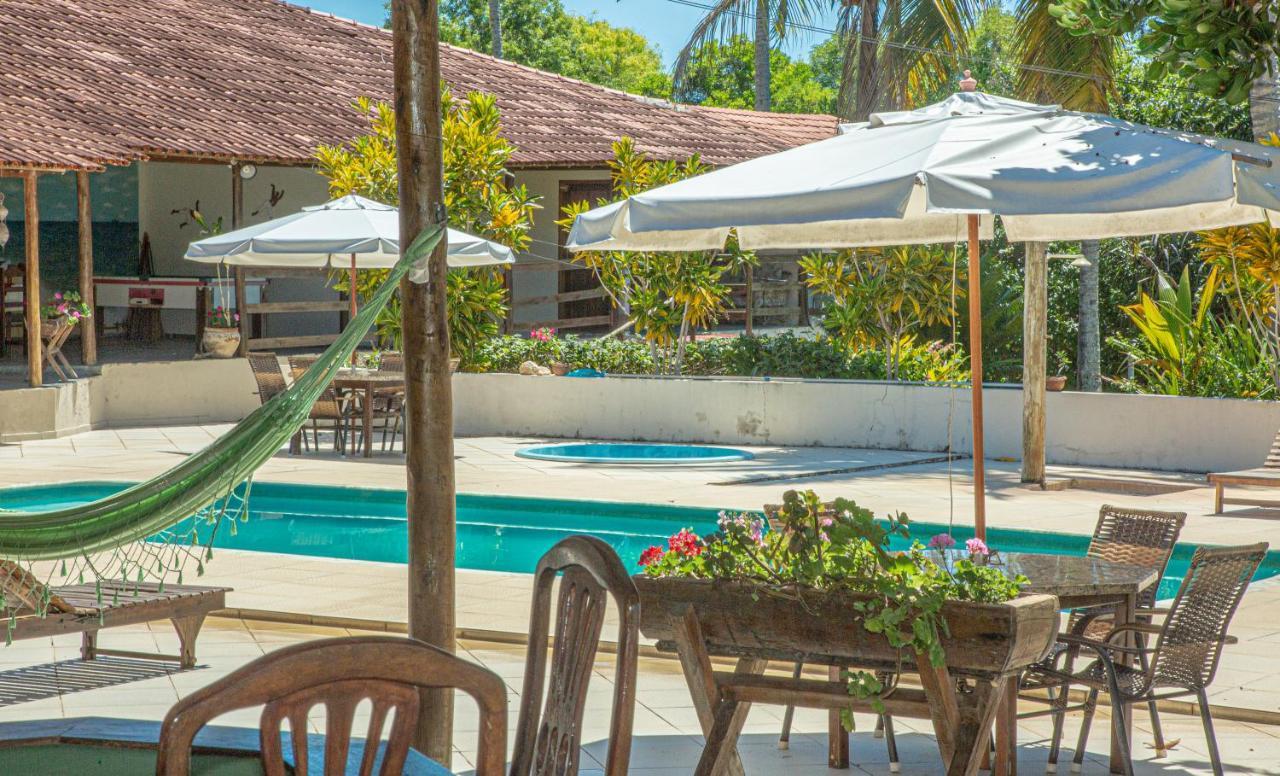 Hotel Praia Da Paixao Prado Bagian luar foto