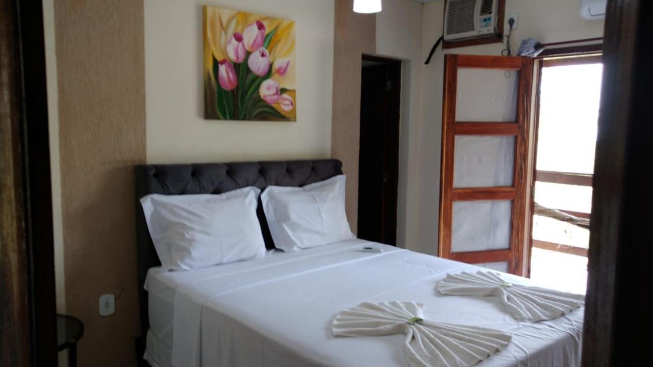 Hotel Praia Da Paixao Prado Bagian luar foto